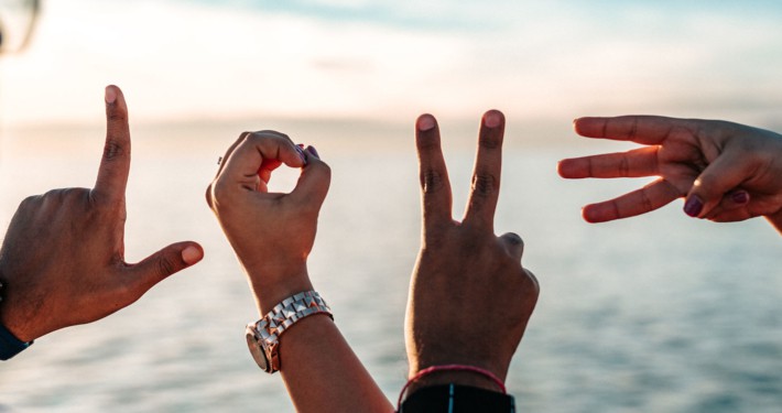 Love written with peoples fingers