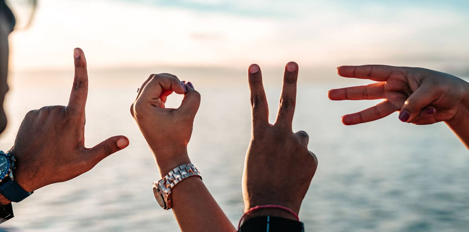 Love written with peoples fingers