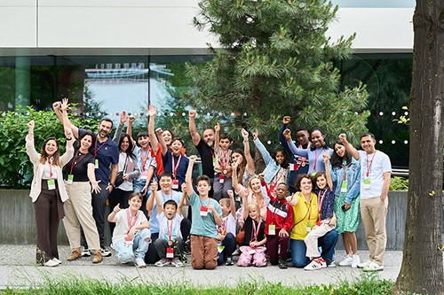 All nine IDEASforEARS 2026 global winners and their families gathered at MED-EL headquarters in Innsbruck, Austria