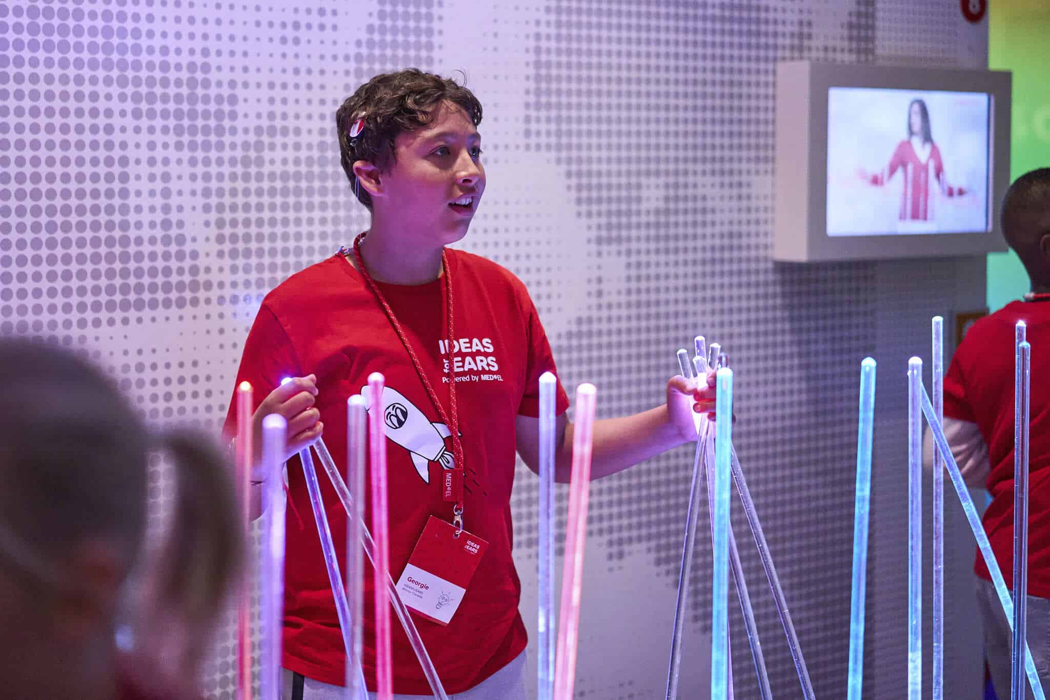Georgie exploring MED-EL headquarters in Innsbruck during the IDEASforEARS winners event